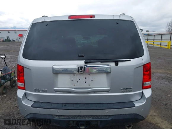 2015 Honda Pilot Touring with VIN 5FNYF4H94FB018152, listed as a IAAI auction lot 41812170 with 130,661 mi miles. Bid and sale history available at carsss.com. Image 16.
