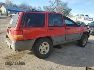 1998 Jeep Grand Cherokee Laredo with VIN 1J4GZ58S7WC105854, listed as a Copart auction lot 82321254 with 178,072 mi miles and Salvage Title. Bid and sale history available at carsss.com. Image 3.