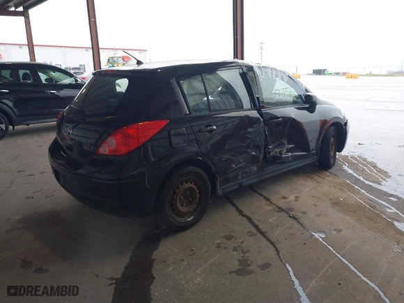 2009 Nissan Versa 1.8 S with VIN 3N1BC13E39L482656, listed as a IAAI auction lot 40930460 with 176,930 mi miles. Bid and sale history available at carsss.com. Image 4.