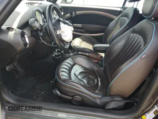 2013 MINI Convertible S with VIN WMWZP3C51DT551373, listed as a Copart auction lot 57878745 with 110,181 mi miles and Salvage title. Bid and sale history available at DreamBid. Image 7.