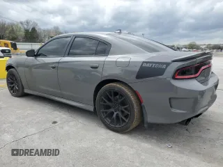 2019 Dodge Charger R/T with VIN 2C3CDXCT4KH526280, listed as a Copart auction lot 51563785 with 102,431 mi miles and Salvage Title. Bid and sale history available at DreamBid. Image 2.