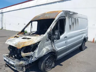 2020 Ford Transit Cargo with VIN 1FTBR1C80LKA75599, listed as a IAAI auction lot 39698416 with Not Provided miles. Bid and sale history available at carsss.com. Image 2.