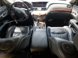 2012 Infiniti M Hybrid with VIN JN1EY1AP0CM910697, listed as a Copart auction lot 60821335 with 145,533 mi miles and Salvage title. Bid and sale history available at DreamBid. Image 8.