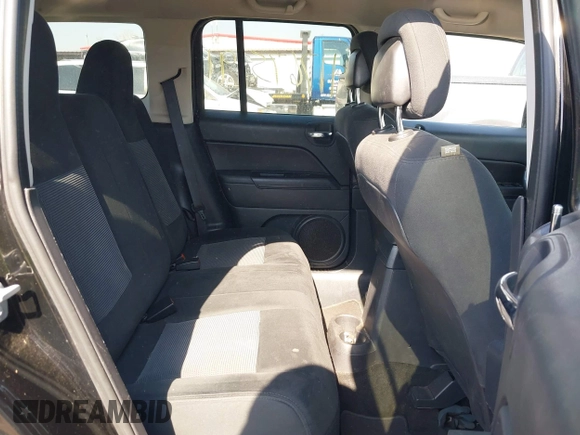 2015 Jeep Patriot Latitude with VIN 1C4NJPFB2FD157907, listed as a IAAI auction lot 41767591 with 111,738 mi miles and . Bid and sale history available at DreamBid. Image 8.