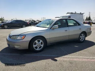 1997 Lexus ES 300 Luxury Sport Sdn with VIN JT8BF22GXV5010055, listed as a Copart auction lot 76507554 with 177,269 mi miles and Salvage Title. Bid and sale history available at carsss.com. Image 1.