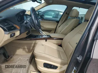 2012 BMW X5 35i with VIN 5UXZV4C51CL748765, listed as a Copart auction lot 62339905 with Not provided miles and Clean title. Bid and sale history available at DreamBid. Image 7.