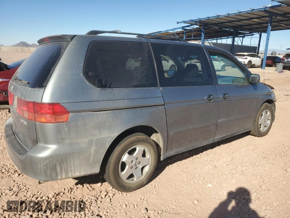 1999 Honda Odyssey EX with VIN 2HKRL1860XH541737, listed as a Copart auction lot 88897965 with 112,164 mi miles and Salvage title. Bid and sale history available at DreamBid. Image 3.