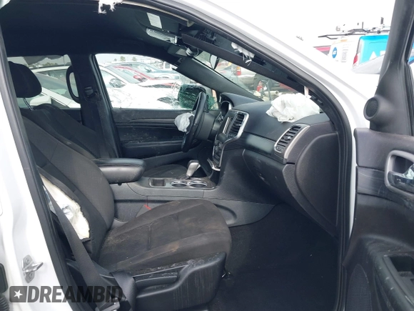 2020 Jeep Grand Cherokee Laredo E with VIN 1C4RJEAG4LC245884, listed as a IAAI auction lot 42564754 with 63,356 mi miles and . Bid and sale history available at DreamBid. Image 5.