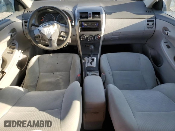 2010 Toyota Corolla with VIN 2T1BU4EE1AC363990, listed as a Copart auction lot 52001595 with 244,000 mi miles and Salvage title. Bid and sale history available at DreamBid. Image 8.