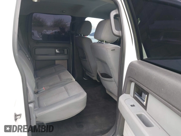 2013 Ford F-150 XL with VIN 1FTFW1ET7DKD70468, listed as a IAAI auction lot 40952588 with 208,052 mi miles. Bid and sale history available at carsss.com. Image 8.