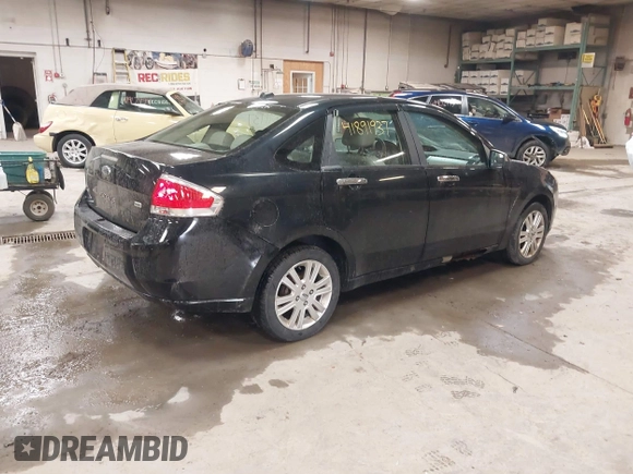 2010 Ford Focus SEL with VIN 1FAHP3HNXAW118514, listed as a IAAI auction lot 41891937 with 118,590 mi miles. Bid and sale history available at carsss.com. Image 4.