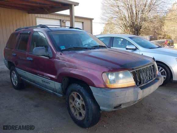 2001 Jeep Grand Cherokee Laredo with VIN 1J4GW48S11C578001, listed as a IAAI auction lot 41671318 with 263,694 mi miles. Bid and sale history available at carsss.com. Image 1.