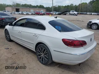 2014 Volkswagen CC Executive z VIN WVWGU7ANXEE507486, wystawiony jako IAAI lot #41943516 z przebiegiem 148 796 mil mil oraz . Historia ofert i sprzedaży dostępna na DreamBid. Obrazek 3.