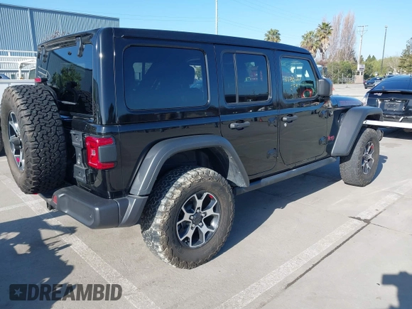 2021 Jeep Wrangler Unlimited Rubicon with VIN 1C4JJXFM5MW722572, listed as a IAAI auction lot 41667167 with Not provided miles and . Bid and sale history available at DreamBid. Image 4.
