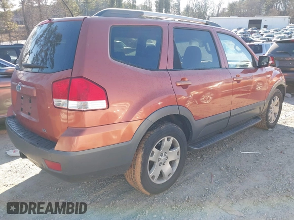 2009 Kia Borrego LX with VIN KNDJJ741295024393, listed as a IAAI auction lot 41368035 with 226,220 mi miles. Bid and sale history available at carsss.com. Image 4.