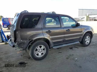 2006 Ford Escape XLT с VIN 1FMYU93146KC65657, выставлен на аукционе Copart как лот 52953835 с пробегом 164 012 миль миль и Списание • Salvage title. История ставок и продаж доступна на DreamBid. Изображение 3.