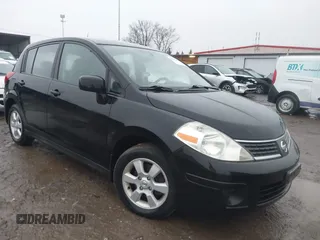 2009 Nissan Versa 1.8 SL with VIN 3N1BC13EX9L390055, listed as a IAAI auction lot 41455877 with 126,718 mi miles. Bid and sale history available at carsss.com. Image 1.