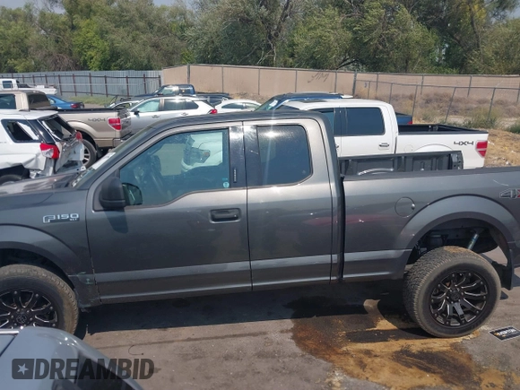 2016 Ford F-150 XLT with VIN 1FTEX1E80GKD98282, listed as a IAAI auction lot 40317900 with 159,605 mi miles. Bid and sale history available at carsss.com. Image 14.