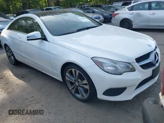 2015 Mercedes-Benz E-Class E 400 with VIN WDDKJ6FB5FF294900, listed as a IAAI auction lot 42067425 with 143,137 mi miles. Bid and sale history available at carsss.com. Image 1.
