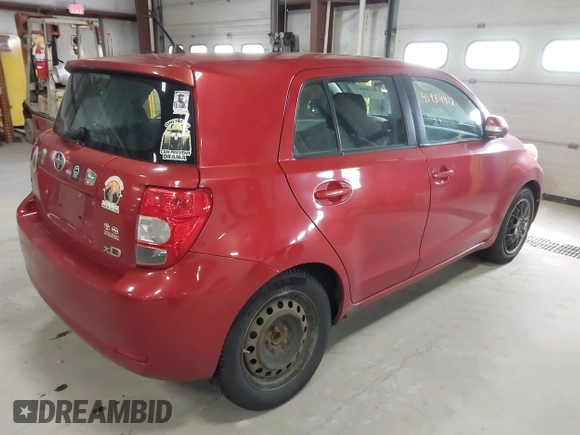 2008 Scion xD with VIN JTKKU10408J019264, listed as a IAAI auction lot 41984412 with 153,147 mi miles. Bid and sale history available at carsss.com. Image 4.