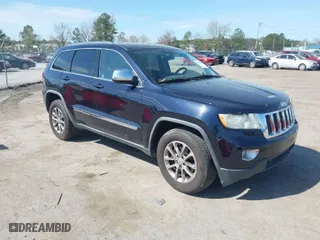 2011 Jeep Grand Cherokee Laredo with VIN 1J4RR4GG2BC508070, listed as a IAAI auction lot 41930814 with 206,658 mi miles. Bid and sale history available at carsss.com. Image 1.