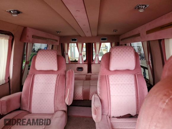 1989 Ford Econoline Cargo with VIN 1FDEE14H4KHC07245, listed as a Copart auction lot 51862145 with 911,092 mi miles and Salvage Title. Bid and sale history available at DreamBid. Image 10.