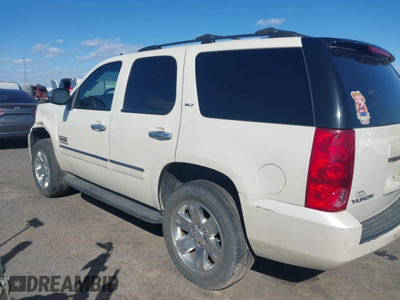 2014 GMC Yukon SLT with VIN 1GKS1CE01ER179379, listed as a IAAI auction lot 41717271 with 136,999 mi miles. Bid and sale history available at carsss.com. Image 14.