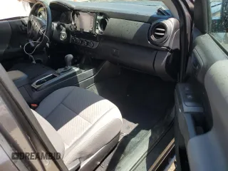 2020 Toyota Tacoma SR z VIN 3TYSZ5AN9LT004270, wystawiony jako Copart lot #55217195 z przebiegiem Nie podano mil oraz Szkoda całkowita • Salvage title. Historia ofert i sprzedaży dostępna na DreamBid. Obrazek 8.