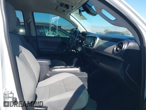 2021 Toyota Tacoma SR with VIN 3TYAX5GN5MT014868, listed as a IAAI auction lot 41549927 with 30,653 mi miles and . Bid and sale history available at DreamBid. Image 5.