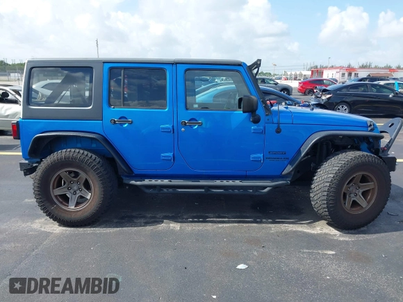 2015 Jeep Wrangler Unlimited Sport with VIN 1C4BJWDG1FL716400, listed as a IAAI auction lot 42645745 with 83,199 mi miles and . Bid and sale history available at DreamBid. Image 14.
