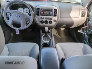 2006 Ford Escape XLT with VIN 1FMYU93166KC50125, listed as a Copart auction lot 53050325 with 136,456 mi miles and Salvage Title. Bid and sale history available at carsss.com. Image 8.