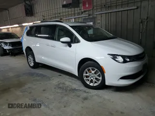 2021 Chrysler Voyager LXi with VIN 2C4RC1DG2MR552266, listed as a Copart auction lot 50742615 with 102,422 mi miles and Salvage Title. Bid and sale history available at DreamBid. Image 4.