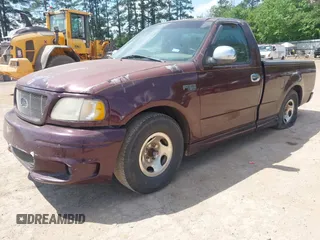 1998 Ford F-150 with VIN 1FTZF1725WNB72765, listed as a IAAI auction lot 42056766 with 210,459 mi miles and . Bid and sale history available at DreamBid. Image 2.