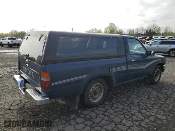 1990 Toyota Pickup DX с VIN JT4RN81P7L5065454, выставлен на аукционе Copart как лот 52913465 с пробегом 366 591 миль миль и Списание • Salvage title. История ставок и продаж доступна на DreamBid. Изображение 3.