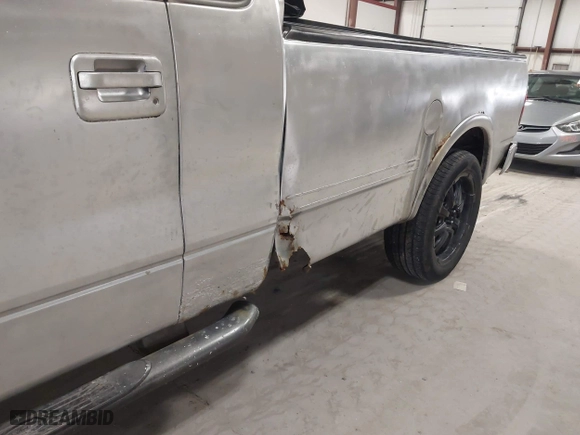 2005 Ford F-150 XL with VIN 1FTRF12W15NA18935, listed as a IAAI auction lot 41942570 with 152,708 mi miles. Bid and sale history available at carsss.com. Image 6.