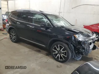 2019 Honda Pilot Touring 7-Passenger with VIN 5FNYF6H65KB092806, listed as a Copart auction lot 54205085 with 130,219 mi miles and Salvage title. Bid and sale history available at DreamBid. Image 4.