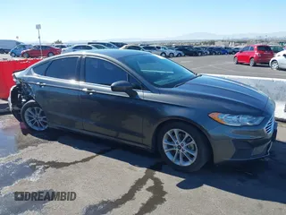 2019 Ford Fusion SE with VIN 3FA6P0HD5KR176497, listed as a IAAI auction lot 41633087 with 103,876 mi miles and . Bid and sale history available at carsss.com. Image 14.
