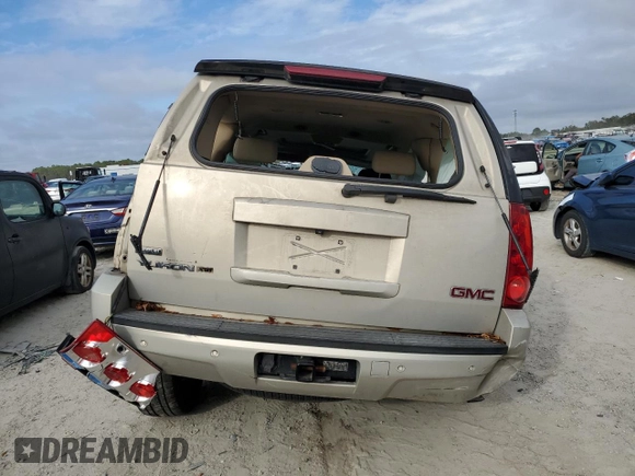 2009 GMC Yukon SLT 4SA z VIN 1GKEC333X9R244790, wystawiony jako Copart lot #86259474 z przebiegiem Nie podano mil oraz Szkoda całkowita • Salvage title. Historia ofert i sprzedaży dostępna na DreamBid. Obrazek 6.