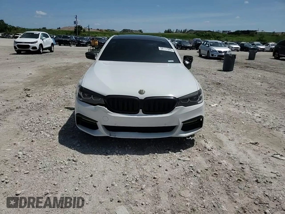 2018 BMW 5 Series 540i with VIN WBAJE5C58JWA96615, listed as a Copart auction lot 56117205 with 87,211 mi miles and Salvage title. Bid and sale history available at DreamBid. Image 13.