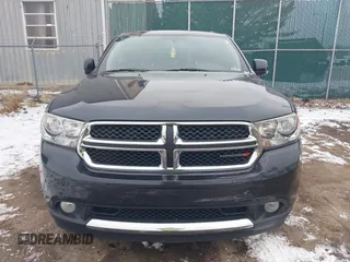 2013 Dodge Durango Crew z VIN 1C4SDJDT7DC684766, wystawiony jako IAAI lot #41277670 z przebiegiem 115 555 mil mil oraz . Historia ofert i sprzedaży dostępna na DreamBid. Obrazek 12.