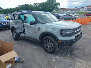 2023 Ford Bronco Sport Badlands z VIN 3FMCR9D90PRE37230, wystawiony jako IAAI lot #42373165 z przebiegiem 13 497 mil mil oraz . Historia ofert i sprzedaży dostępna na DreamBid. Obrazek 1.
