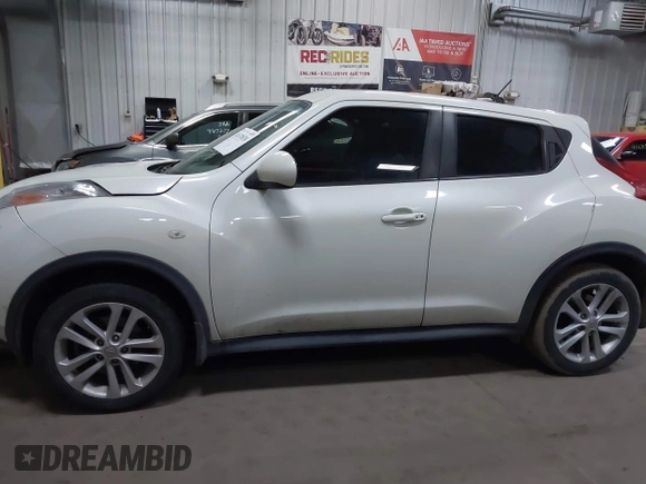 2012 Nissan Juke SL with VIN JN8AF5MV8CT122182, listed as a IAAI auction lot 41670838 with 120,351 mi miles. Bid and sale history available at carsss.com. Image 14.