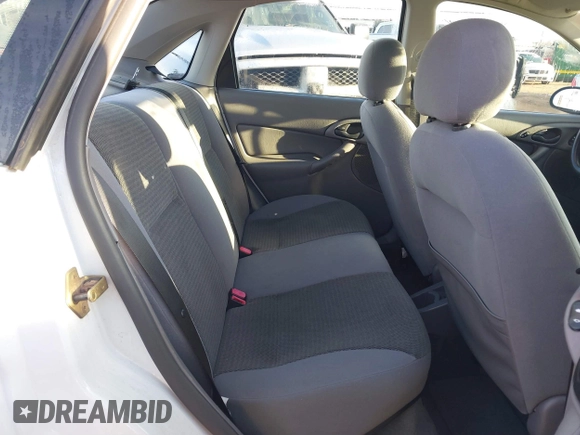 2004 Ford Focus SE with VIN 1FAFP34324W137459, listed as a IAAI auction lot 41634502 with 134,113 mi miles and . Bid and sale history available at DreamBid. Image 8.