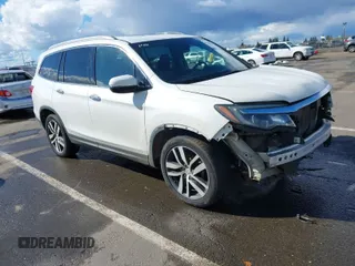 2017 Honda Pilot Elite with VIN 5FNYF6H06HB041609, listed as a IAAI auction lot 41804477 with 134,535 mi miles and . Bid and sale history available at DreamBid. Image 1.