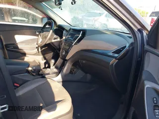 2016 Hyundai Santa Fe z VIN 5XYZUDLB3GG312687, wystawiony jako IAAI lot #42096854 z przebiegiem 162 586 mil mil oraz . Historia ofert i sprzedaży dostępna na DreamBid. Obrazek 5.