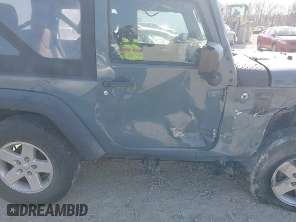 2014 Jeep Wrangler Sport with VIN 1C4AJWAG5EL271318, listed as a IAAI auction lot 41780040 with 128,942 mi miles and . Bid and sale history available at DreamBid. Image 13.