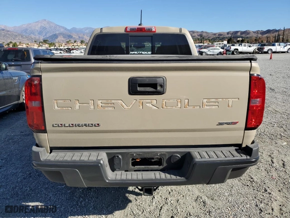 2022 Chevrolet Colorado 4WD ZR2 with VIN 1GCGTEEN4N1271054, listed as a Copart auction lot 87038104 with 13,697 mi miles and Salvage Title. Bid and sale history available at carsss.com. Image 6.