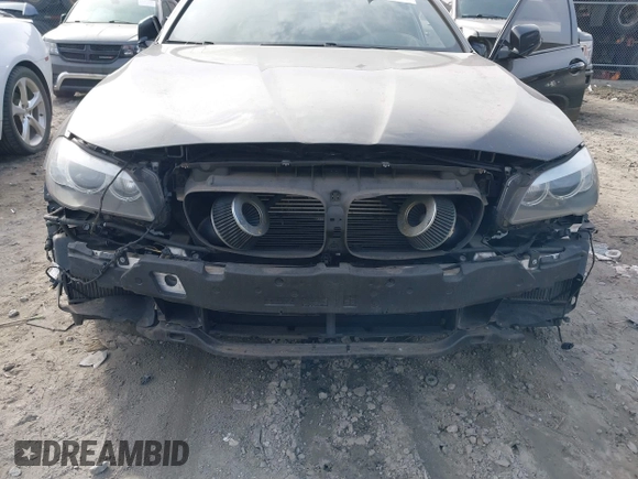 2013 BMW 5 Series 550i xDrive with VIN WBAFU9C50DDY70918, listed as a IAAI auction lot 41501293 with 77,675 mi miles and . Bid and sale history available at carsss.com. Image 6.