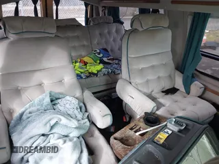 1992 Ford Econoline Cargo with VIN 1FDEE14NXNHA02328, listed as a IAAI auction lot 41637970 with Not Provided miles and . Bid and sale history available at carsss.com. Image 8.