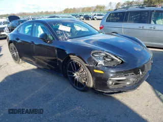 2023 Porsche Panamera with VIN WP0AJ2A77PL100226, listed as a IAAI auction lot 41554538 with 52,257 mi miles and . Bid and sale history available at DreamBid. Image 1.